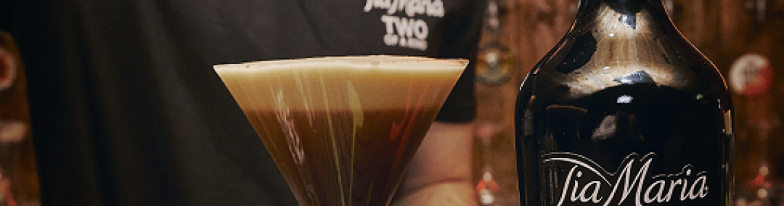 Three coffee beans placed onto the froth of the Tia Espresso Martini, hallmark of a one-of-a-kind cockta