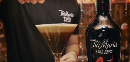 Three coffee beans placed onto the froth of the Tia Espresso Martini, hallmark of a one-of-a-kind cockta